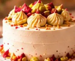 Signature cake with piped rosettes and pistachios